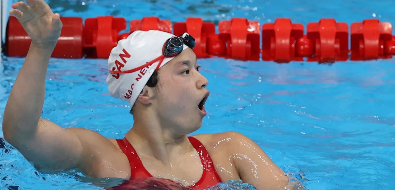 Natación, 100m mariposa: Margaret Macneil se lleva el oro